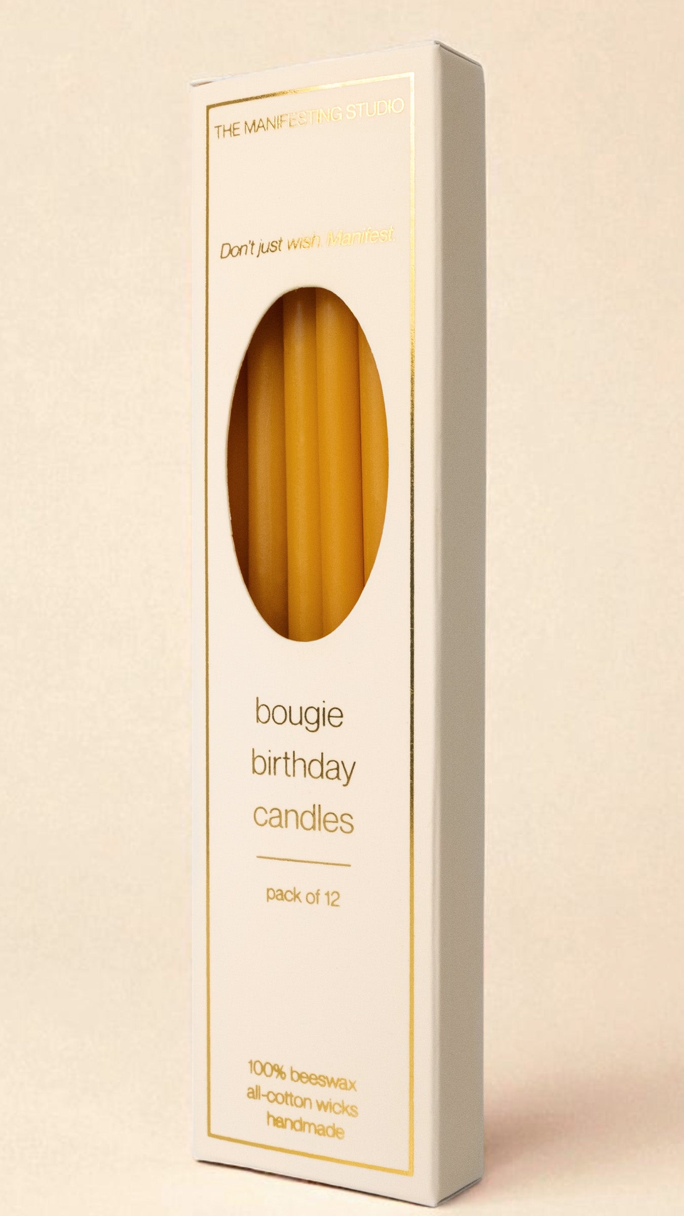 The Manifesting Studio Bougie Birthday Candles retail box, luxury packaging with gold foil details, shelf-ready for boutiques.