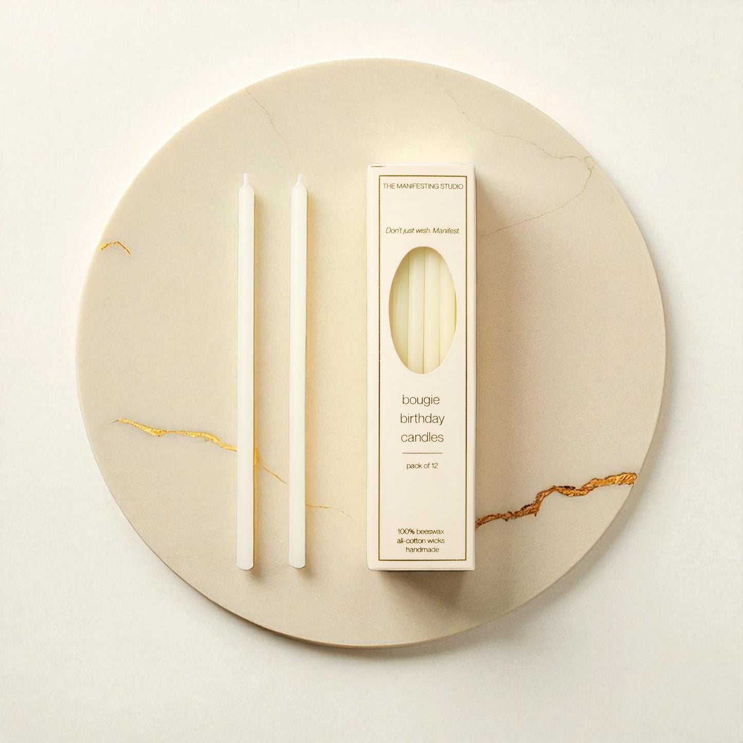 "The Manifesting Studio Ivory beeswax birthday candles, 6-inch tapers in gift-ready box for manifesting rituals."