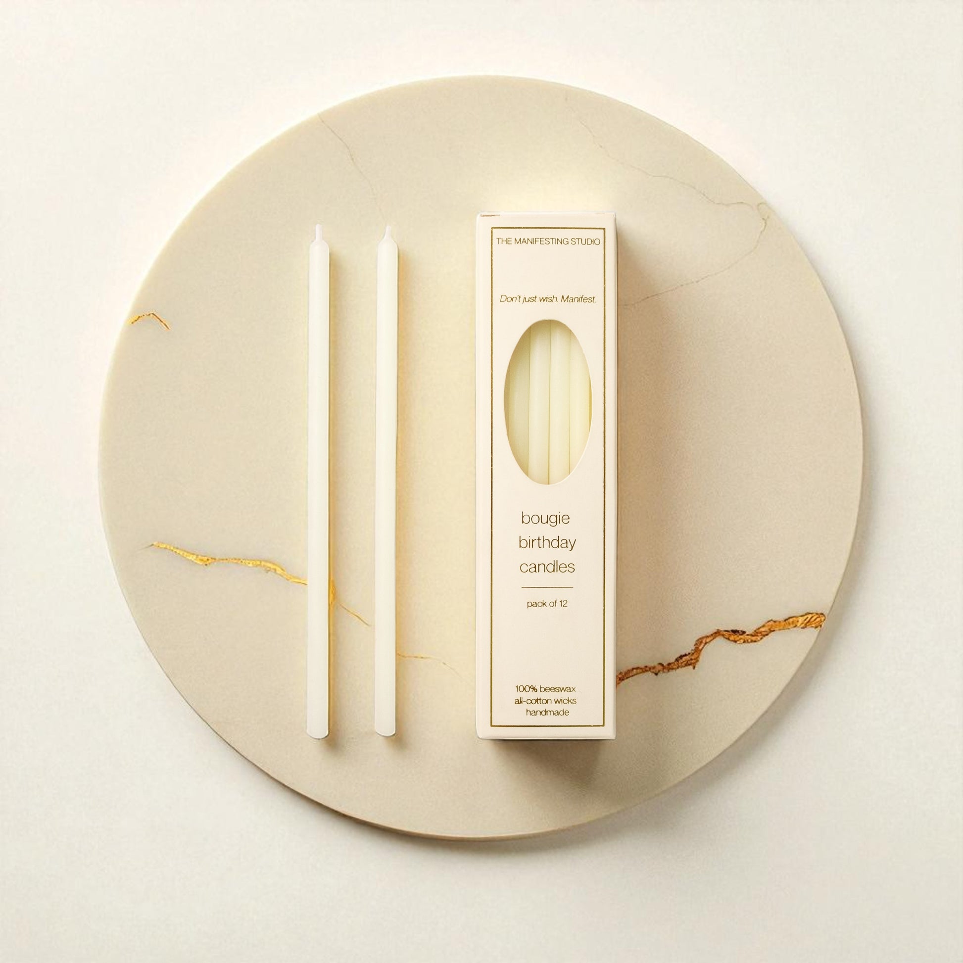 "The Manifesting Studio Ivory beeswax birthday candles, 6-inch tapers in gift-ready box for manifesting rituals."